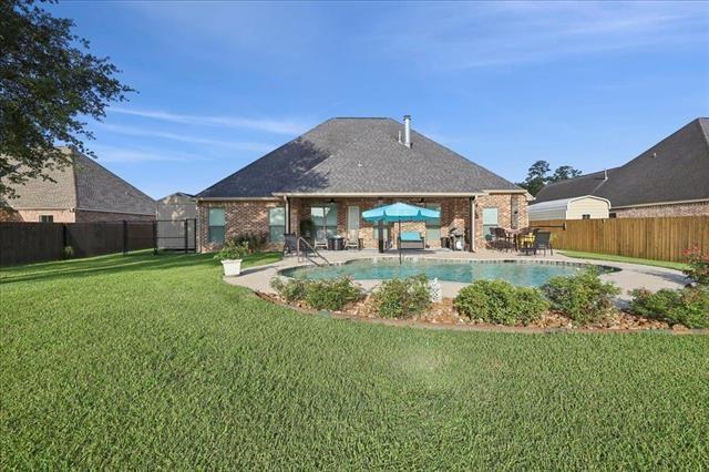 271 Hannah Ln, Lumberton, TX 77657 - view of swimming pool featuring a fenced backyard and a patio