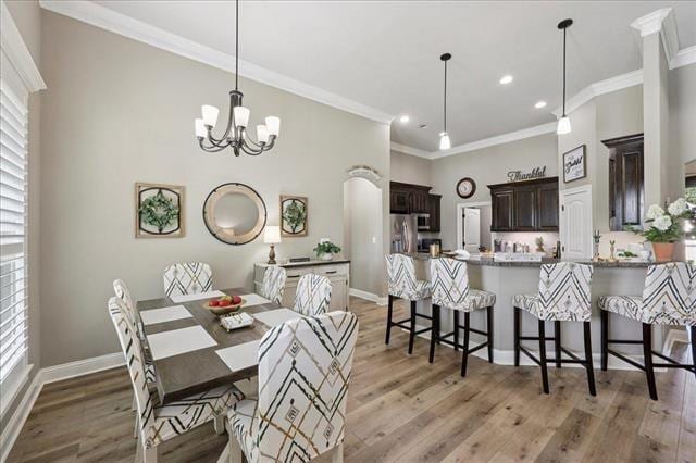 271 Hannah Ln, Lumberton, TX 77657 - dining space with crown molding, light wood-type flooring, a chandelier, and recessed lighting