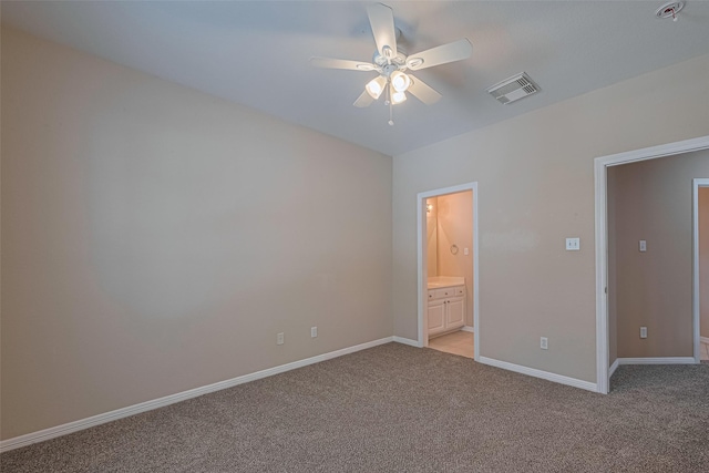 3415 Monarch Meadow Ln, Pearland, TX 77581 - unfurnished bedroom with light colored carpet, ensuite bathroom, and ceiling fan