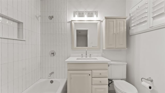 5010 Redstart St, Houston, TX 77035 - bathroom featuring vanity and shower / tub combination