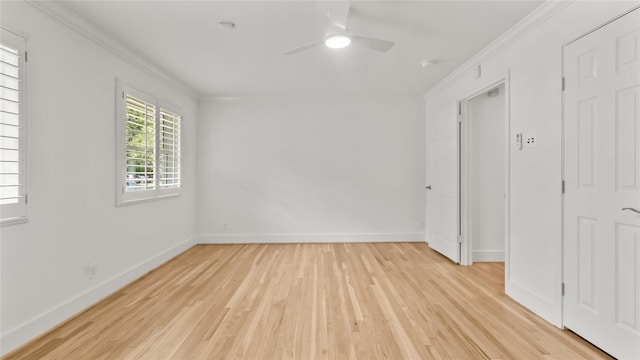 5010 Redstart St, Houston, TX 77035 - empty room with crown molding, ceiling fan, and light wood-type flooring