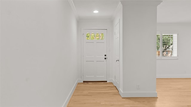 5010 Redstart St, Houston, TX 77035 - entryway featuring light wood finished floors, crown molding, and recessed lighting