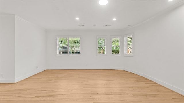 5010 Redstart St, Houston, TX 77035 - empty room featuring light wood finished floors, recessed lighting, and crown molding