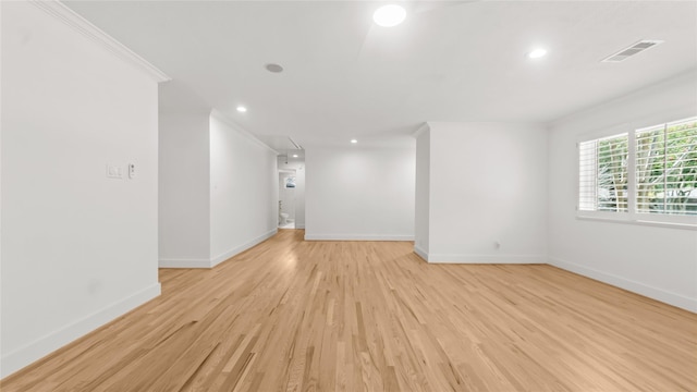 5010 Redstart St, Houston, TX 77035 - empty room with light wood finished floors, recessed lighting, and crown molding