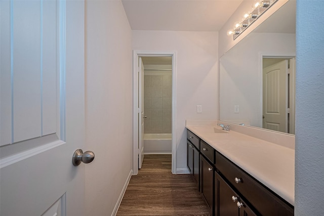 10314 White Fir Villa Ave, Houston, TX 77044 - full bath featuring vanity and wood finished floors