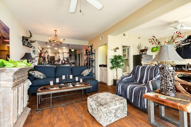 7700 Seawall Blvd Unit P9, Galveston, TX 77551 - living area featuring ceiling fan, wood finished floors, and a chandelier