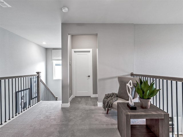 21738 Emerton Crescent Way, Cypress, TX 77433 - sitting room with carpet floors and an upstairs landing