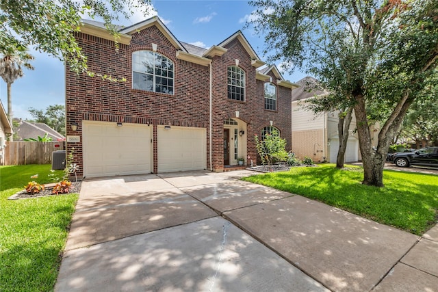 5506 Poundstone Ct, Sugar Land, TX 77479 - traditional home with brick siding, driveway, and a garage
