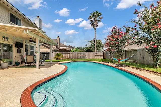 5506 Poundstone Ct, Sugar Land, TX 77479 - view of pool with a patio area, a fenced backyard, and a ceiling fan