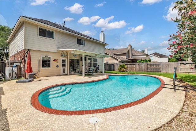 5506 Poundstone Ct, Sugar Land, TX 77479 - view of pool featuring a patio area and a fenced backyard