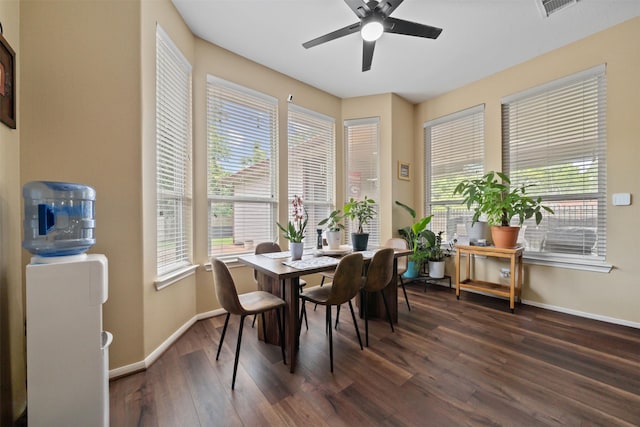 210 Southwood Cir, Baytown, TX 77520 - dining room with dark wood-type flooring and ceiling fan