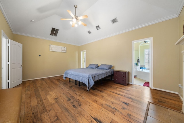 210 Southwood Cir, Baytown, TX 77520 - bedroom with lofted ceiling, light wood-type flooring, ornamental molding, ceiling fan, and connected bathroom