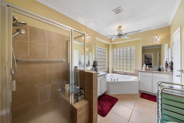 210 Southwood Cir, Baytown, TX 77520 - full bath featuring ceiling fan, a garden tub, vanity, a shower stall, and ornamental molding