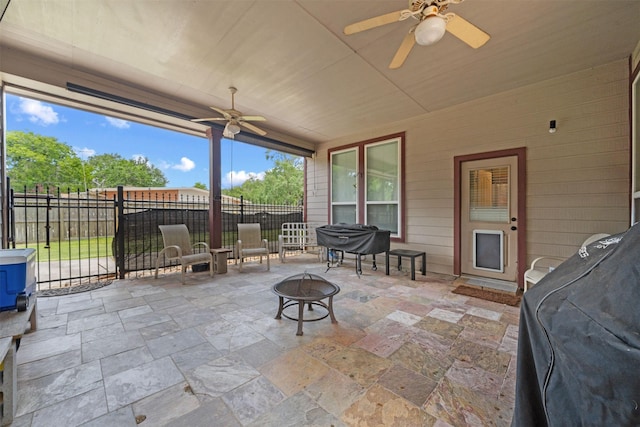 210 Southwood Cir, Baytown, TX 77520 - view of patio / terrace featuring a fire pit and ceiling fan