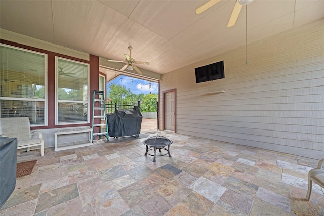 210 Southwood Cir, Baytown, TX 77520 - view of patio featuring ceiling fan, a fire pit, and grilling area