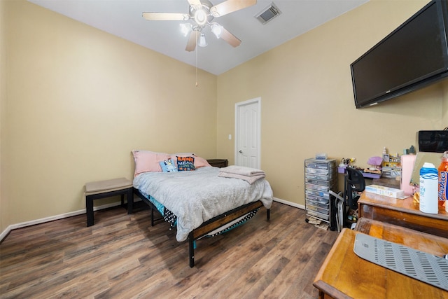 210 Southwood Cir, Baytown, TX 77520 - bedroom with wood finished floors and a ceiling fan