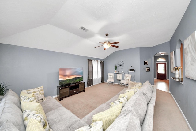 118 Long Canyon Ln, Richmond, TX 77469 - carpeted living area featuring arched walkways, vaulted ceiling, and a ceiling fan