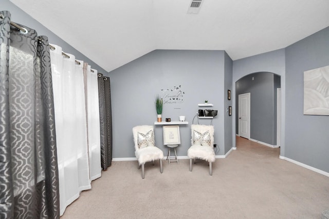 118 Long Canyon Ln, Richmond, TX 77469 - living area featuring arched walkways, carpet floors, and vaulted ceiling