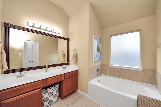 118 Long Canyon Ln, Richmond, TX 77469 - bathroom featuring tile patterned floors, a garden tub, double vanity, and lofted ceiling