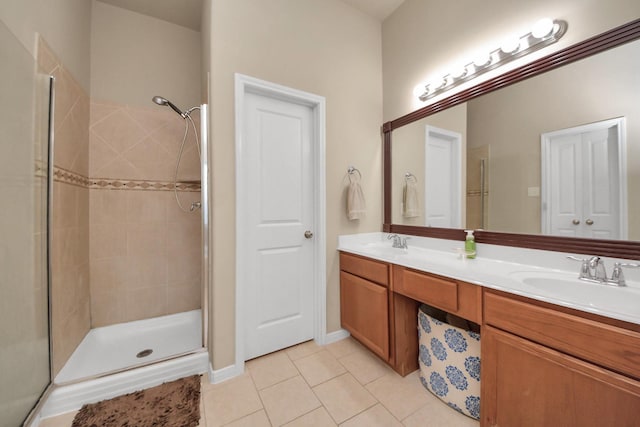 118 Long Canyon Ln, Richmond, TX 77469 - bathroom with tile patterned flooring, tiled shower, and double vanity