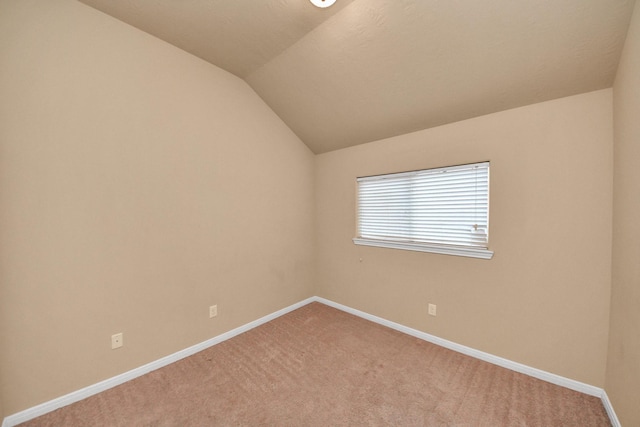 118 Long Canyon Ln, Richmond, TX 77469 - empty room with lofted ceiling and light colored carpet