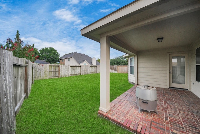 118 Long Canyon Ln, Richmond, TX 77469 - fenced backyard featuring a patio