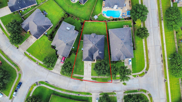118 Long Canyon Ln, Richmond, TX 77469 - aerial view of residential area featuring a pool and property parcel outlined