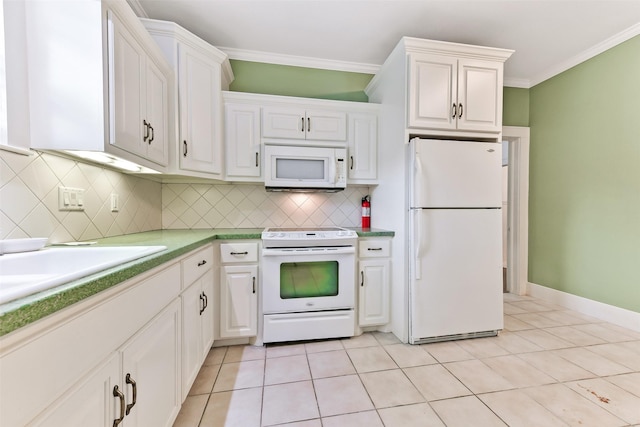 4701 Avenue N 1/2 Ave N 1/2, Galveston, TX 77551 - kitchen featuring white appliances, crown molding, decorative backsplash, white cabinetry, and light tile patterned floors