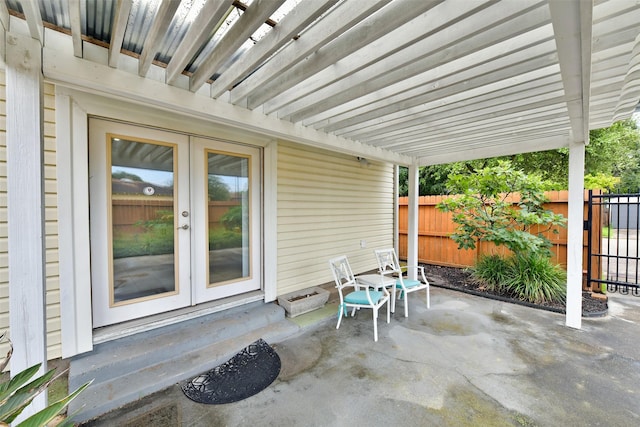 4701 Avenue N 1/2 Ave N 1/2, Galveston, TX 77551 - view of patio featuring french doors