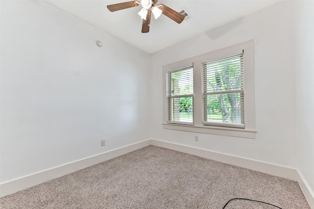 4701 Avenue N 1/2 Ave N 1/2, Galveston, TX 77551 - carpeted empty room with a ceiling fan and baseboards