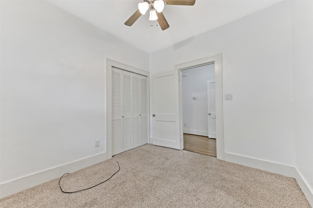 4701 Avenue N 1/2 Ave N 1/2, Galveston, TX 77551 - unfurnished bedroom featuring carpet flooring, a closet, and ceiling fan