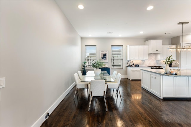 1822 Mcilhenny St Unit A, Houston, TX 77004 - dining room with dark wood-style floors and recessed lighting