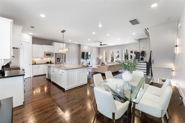 1822 Mcilhenny St Unit A, Houston, TX 77004 - dining space featuring recessed lighting, dark wood finished floors, and ceiling fan