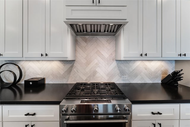1822 Mcilhenny St Unit A, Houston, TX 77004 - kitchen with stainless steel gas range oven, custom exhaust hood, dark countertops, and white cabinets