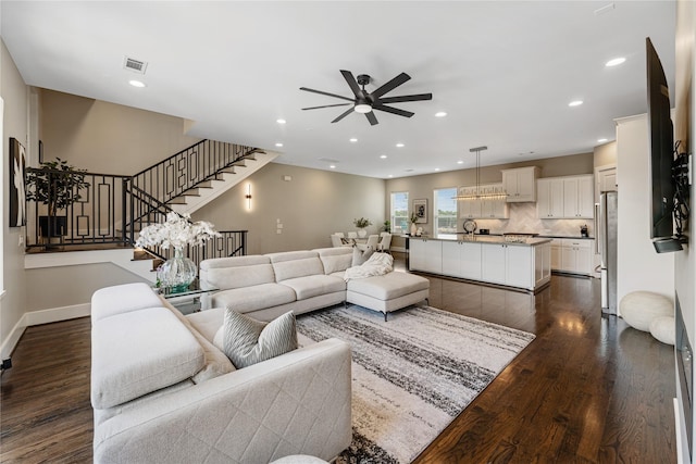 1822 Mcilhenny St Unit A, Houston, TX 77004 - living area with a ceiling fan, dark wood-type flooring, recessed lighting, and stairs