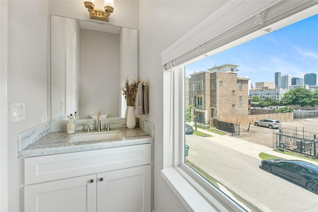 1822 Mcilhenny St Unit A, Houston, TX 77004 - bathroom featuring a city view and vanity