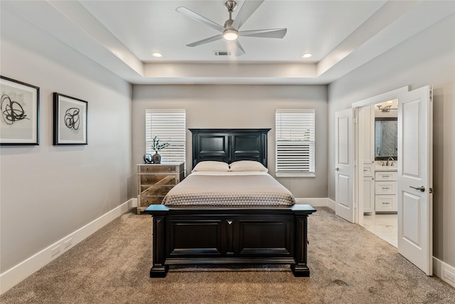 1822 Mcilhenny St Unit A, Houston, TX 77004 - bedroom with light carpet, a raised ceiling, ensuite bath, recessed lighting, and ceiling fan