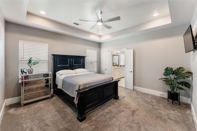 1822 Mcilhenny St Unit A, Houston, TX 77004 - bedroom featuring a tray ceiling, light colored carpet, recessed lighting, ensuite bathroom, and ceiling fan