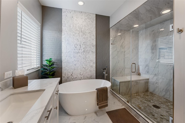 1822 Mcilhenny St Unit A, Houston, TX 77004 - full bathroom with marble tiled flooring, a soaking tub, a marble finish shower, vanity, and recessed lighting