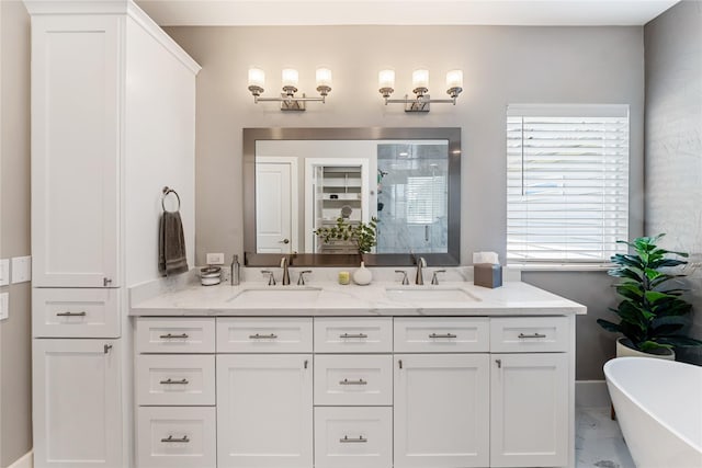 1822 Mcilhenny St Unit A, Houston, TX 77004 - bathroom with a shower stall, double vanity, a soaking tub, and marble finish flooring