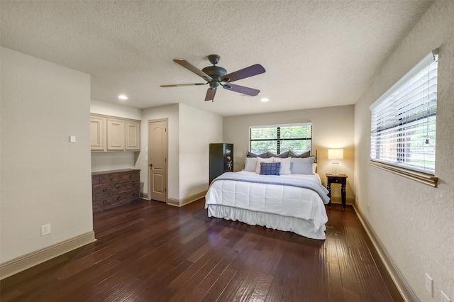 18120 County Road 127, Pearland, TX 77581 - bedroom featuring dark wood-style floors, a textured ceiling, a ceiling fan, and recessed lighting