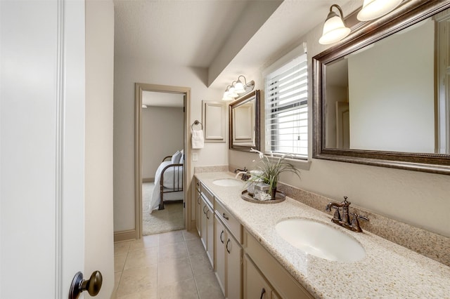 18120 County Road 127, Pearland, TX 77581 - bathroom with double vanity and tile patterned floors