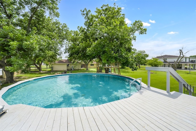 18120 County Road 127, Pearland, TX 77581 - swimming pool with a yard and a deck