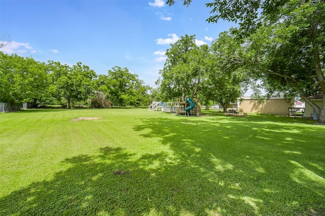 18120 County Road 127, Pearland, TX 77581 - view of grassy yard with a playground