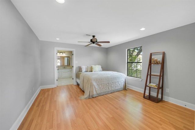 18120 County Road 127, Pearland, TX 77581 - bedroom featuring light wood-type flooring, recessed lighting, ensuite bathroom, and a ceiling fan