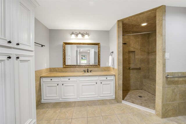 18120 County Road 127, Pearland, TX 77581 - bathroom with vanity, walk in shower, and tile patterned flooring