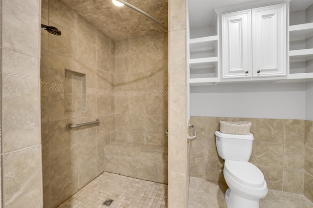 18120 County Road 127, Pearland, TX 77581 - bathroom with a shower stall and tile walls