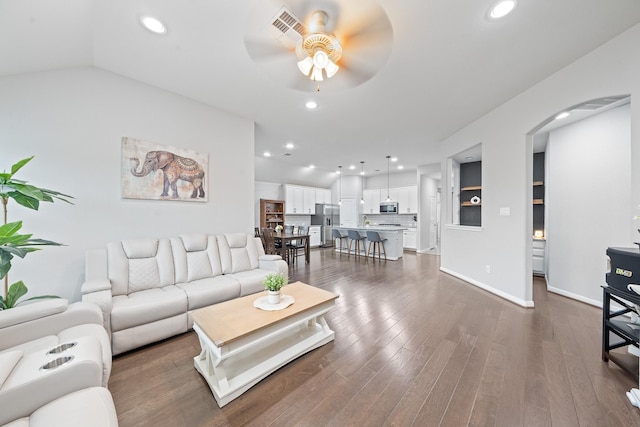 30104 Prairie Creek Ct, Brookshire, TX 77423 - living room with a ceiling fan, arched walkways, dark wood finished floors, and recessed lighting