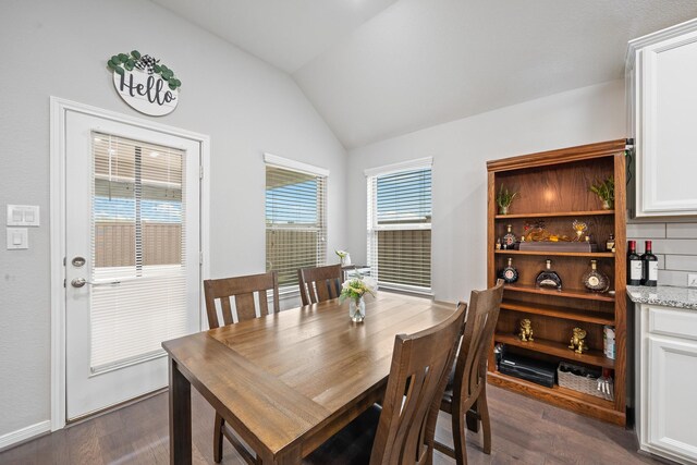 30104 Prairie Creek Ct, Brookshire, TX 77423 - dining area with lofted ceiling and dark wood-style flooring
