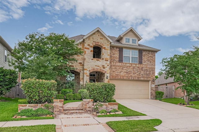 16747 Highland Country Dr, Cypress, TX 77433 - view of front of house with stone siding, driveway, an attached garage, and brick siding